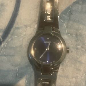 Seiko Silver Watch with Black Dial. Needs battery.